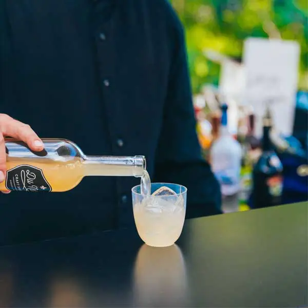 Bartender pouring cocktail